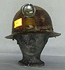 Image - helmet and carbide lamp