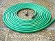 garden hose, loose with detail of threaded end, photograph. Wikimedia Commons
